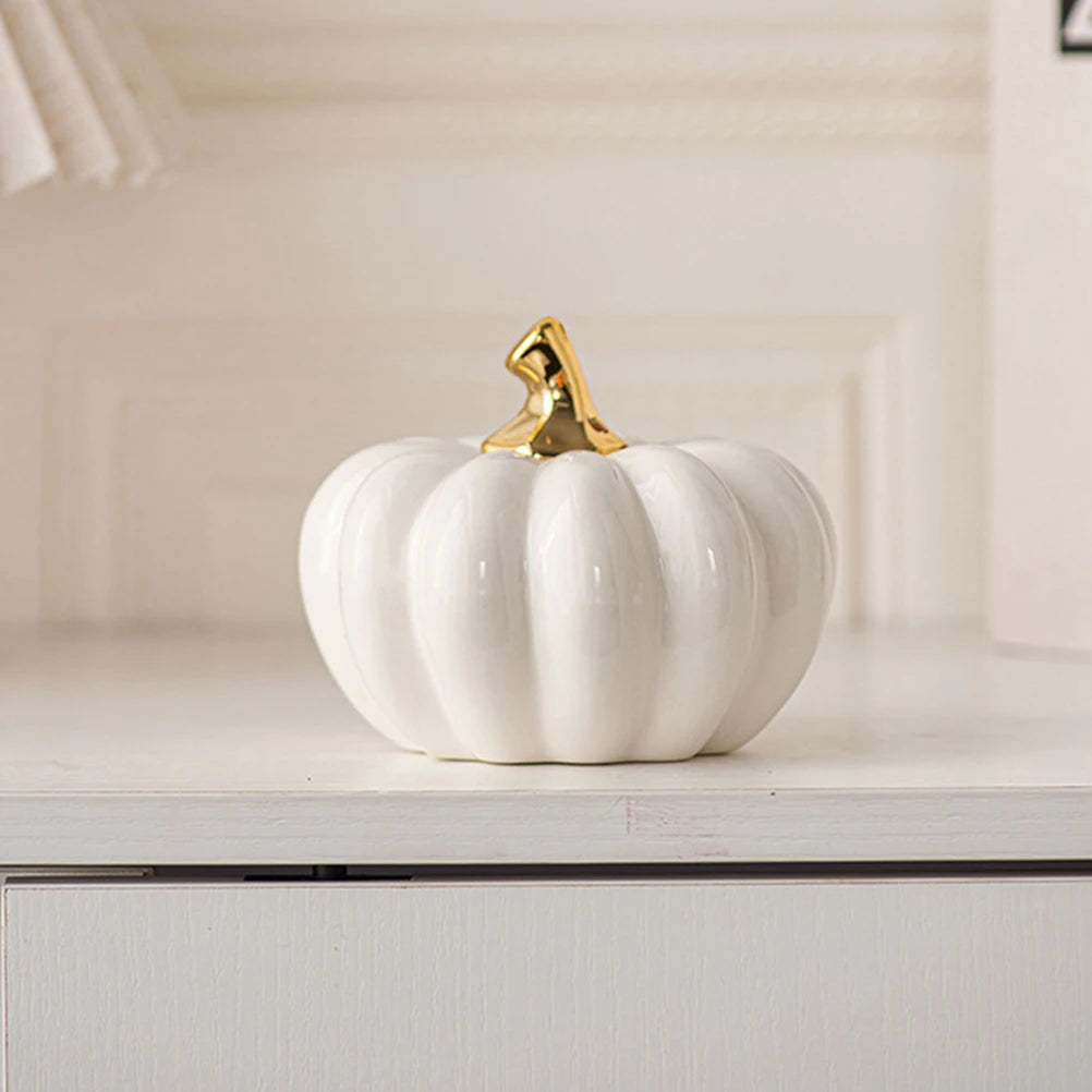 White and gold ceramic pumpkin – autumn and Christmas table decoration