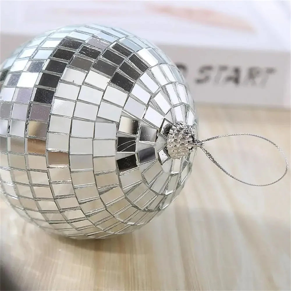 Silver disco ball ornament with classic mirrored tile design - modern festive decoration for contemporary holiday styling