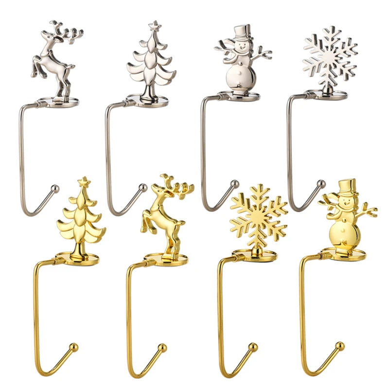 Set of gold and silver metal Christmas stocking holders – reindeer, snowflake, snowman and tree motifs