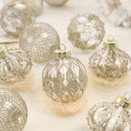 Champagne gold Christmas bauble set of nine featuring matte, glitter, and metallic finishes - elegant ornaments for luxury Nordic-inspired festive styling