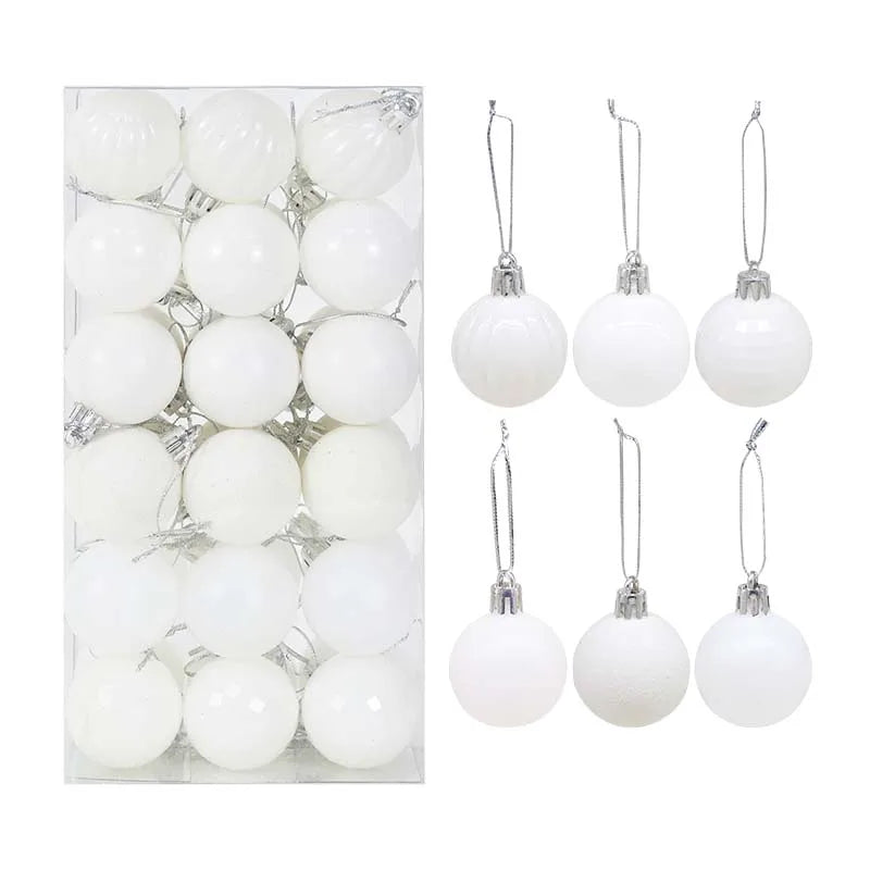 White Christmas bauble collection with frosted, pearlescent, and glitter textures - timeless décor for minimalist festive styling